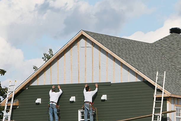 Professional Siding technician working in Falcon, NC